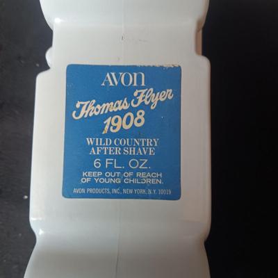 A COLLECTION OF VINTAGE AVON COLOGNE/AFTER SHAVE VEHICLES MOSTLY FULL