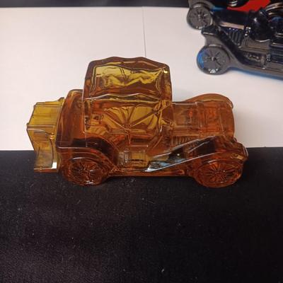 A COLLECTION OF VINTAGE AVON COLOGNE/AFTER SHAVE VEHICLES MOSTLY FULL