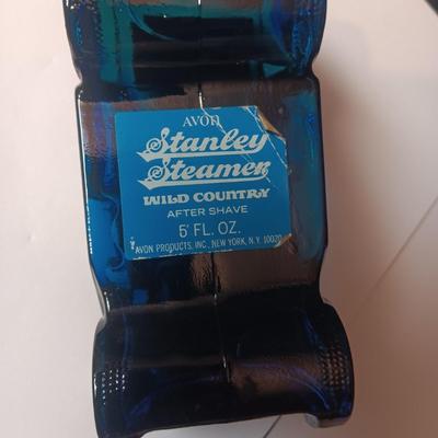 A COLLECTION OF VINTAGE AVON COLOGNE/AFTER SHAVE VEHICLES MOSTLY FULL