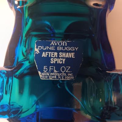 A COLLECTION OF VINTAGE AVON COLOGNE/AFTER SHAVE VEHICLES MOSTLY FULL