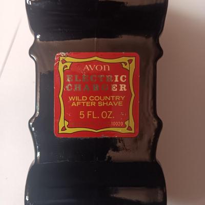 A COLLECTION OF VINTAGE AVON COLOGNE/AFTER SHAVE VEHICLES MOSTLY FULL