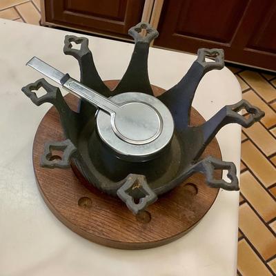 Vintage red fondue set, has original instructions, base, warmer, skewers, and pot