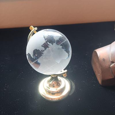 SMALLER GLASS GLOBE ON STAND AND METAL ABE LINCOLN FIRST FEDERAL COIN BANK