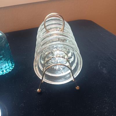 CRYSTAL APPLE JAM JAR, BLUE GLASS BOTTLE W/BIRD TOPPER AND GLASS COASTERS IN A STAND