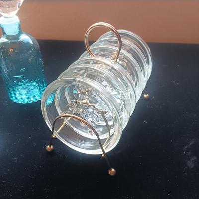 CRYSTAL APPLE JAM JAR, BLUE GLASS BOTTLE W/BIRD TOPPER AND GLASS COASTERS IN A STAND
