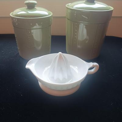 2 GREEN CANISTERS AND A MILK GLASS JUICER