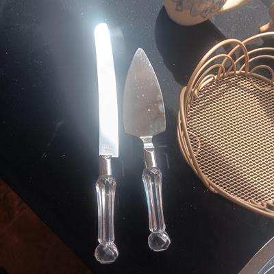 GLASS PLATTER, METAL BASKET, CLAY CREAMER, CAKE SERVING UTENSILS AND METAL SERVING TRAY