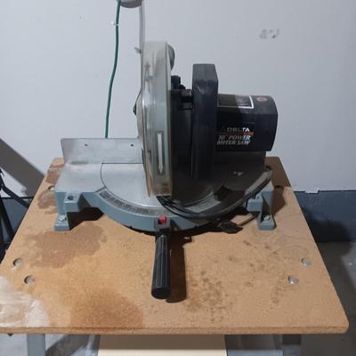 DELTA 10" MITER SAW ON A STAND, ROLLER STAND