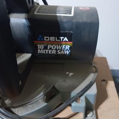 DELTA 10" MITER SAW ON A STAND, ROLLER STAND
