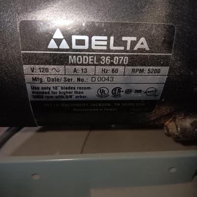 DELTA 10" MITER SAW ON A STAND, ROLLER STAND