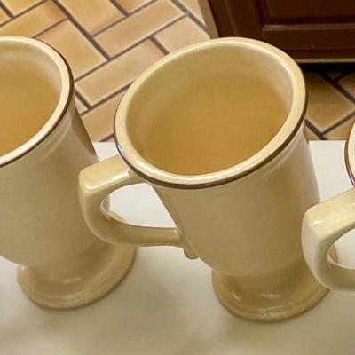 Four Pfaltzgraff Village coffee mugs