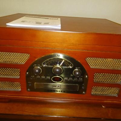 CROSLEY AM/FM STEREO, PHONOGRAPH, CD AND CASSETTE PLAYERS