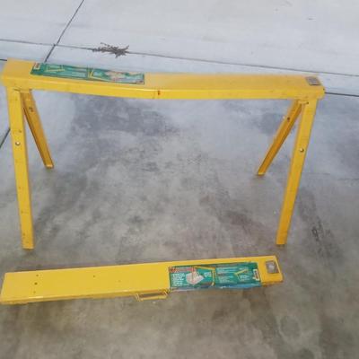 PAIR OF FOLDING METAL SAW HORSES, PUSH BROOM AND FLOOR SQUEEGEE