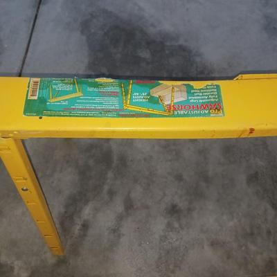 PAIR OF FOLDING METAL SAW HORSES, PUSH BROOM AND FLOOR SQUEEGEE