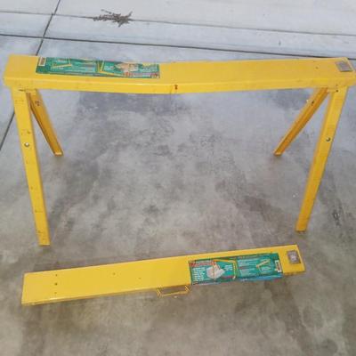 PAIR OF FOLDING METAL SAW HORSES, PUSH BROOM AND FLOOR SQUEEGEE
