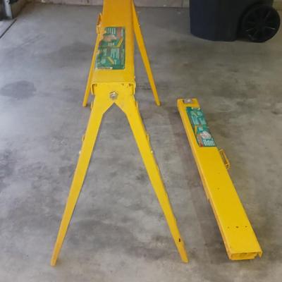 PAIR OF FOLDING METAL SAW HORSES, PUSH BROOM AND FLOOR SQUEEGEE