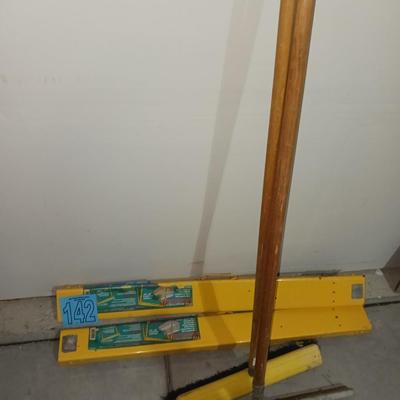 PAIR OF FOLDING METAL SAW HORSES, PUSH BROOM AND FLOOR SQUEEGEE