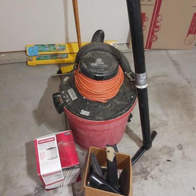 LARGE SHOP VAC WITH ATTACHMENTS AND EXTRA FILTER
