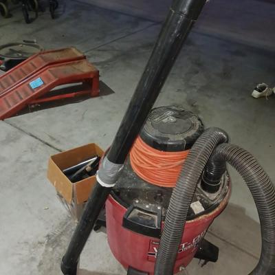 LARGE SHOP VAC WITH ATTACHMENTS AND EXTRA FILTER