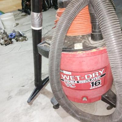 LARGE SHOP VAC WITH ATTACHMENTS AND EXTRA FILTER