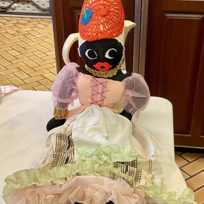 Vintage doll from Barbados dressed in traditional 18 th century costume