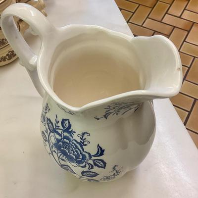 Blue and white pitcher, has small chip on lip