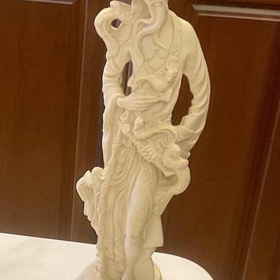 Cast stone oriental figures made in Mexico