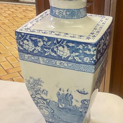 Stoke on Trent blue and white vase has hairline crack circled in picture