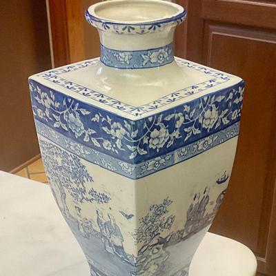 Stoke on Trent blue and white vase has hairline crack circled in picture