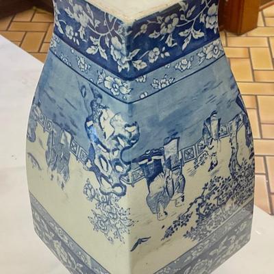 Stoke on Trent blue and white vase has hairline crack circled in picture