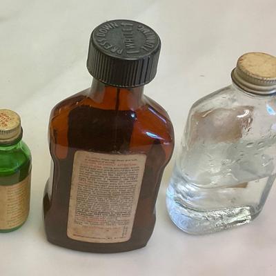3 vintage glass bottles from medicine closet