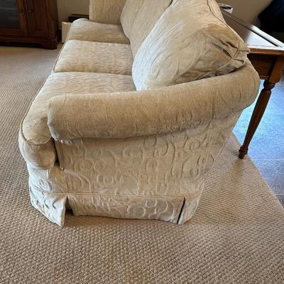 IVORY COLORED SOFA WITH SLIPCOVER CUSHIONS