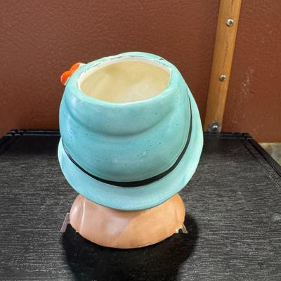 Cute little boy head vase