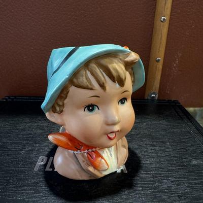 Cute little boy head vase