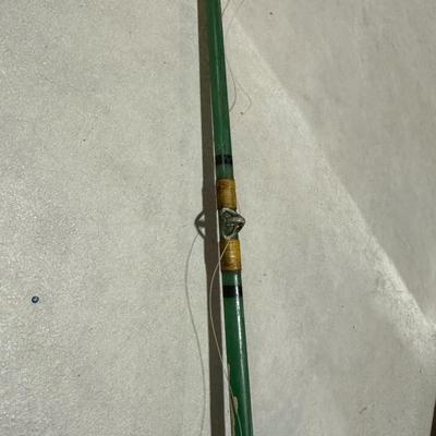 FISHING POLES WITH REELS AND A NYLON BAG