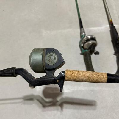 FISHING POLES WITH REELS AND A NYLON BAG