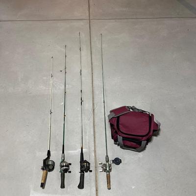 FISHING POLES WITH REELS AND A NYLON BAG
