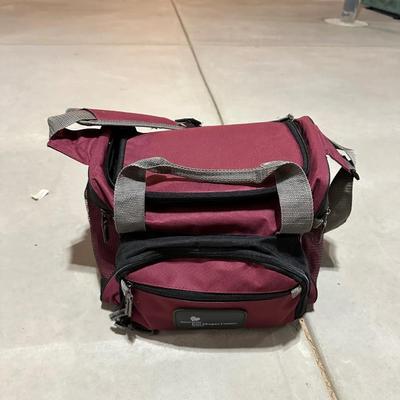 FISHING POLES WITH REELS AND A NYLON BAG