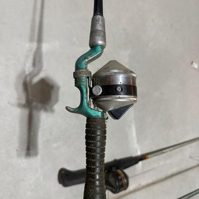 FISHING POLES WITH REELS AND A NYLON BAG