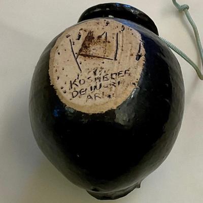Black face pottery ashtray made in Arkansas