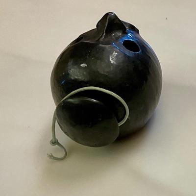 Black face pottery ashtray made in Arkansas
