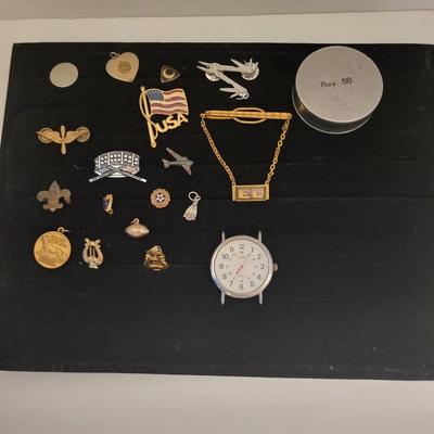 A COLLECTION OF PINS AND MEDALS PLUS WORKING TIMEX WATCH