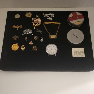 A COLLECTION OF PINS AND MEDALS PLUS WORKING TIMEX WATCH