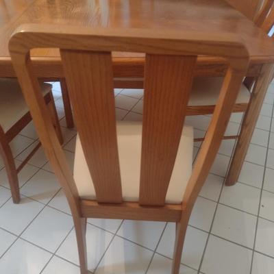 Solid Wood Dining Table with Eight Matching Chairs