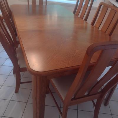 Solid Wood Dining Table with Eight Matching Chairs