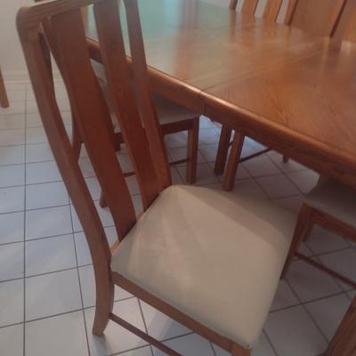 Solid Wood Dining Table with Eight Matching Chairs
