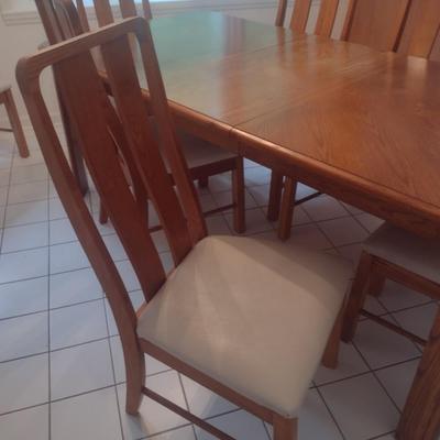Solid Wood Dining Table with Eight Matching Chairs