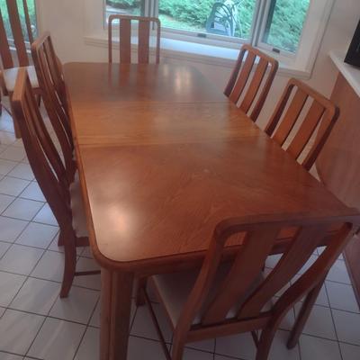 Solid Wood Dining Table with Eight Matching Chairs