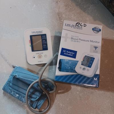 LUGGAGE, EURO OUTLET ADAPTERS, TRAVEL IRON AND BLOOD PRESSURE MONITOR