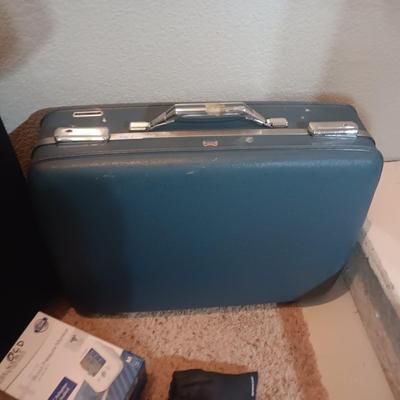 LUGGAGE, EURO OUTLET ADAPTERS, TRAVEL IRON AND BLOOD PRESSURE MONITOR
